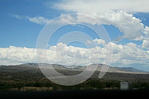 USA.  Red mountains Utah. Clouds