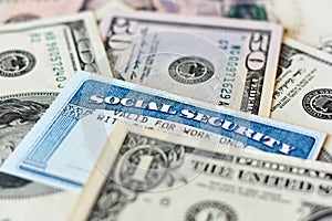 USA social security cards and dollar bills