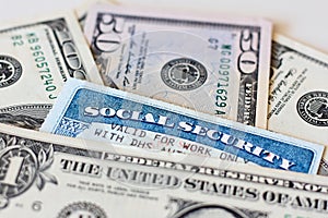 USA social security cards and dollar bills