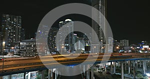 USA transportation infrastructure concept. Above view of wide highway crossroads in Miami city, Florida at night with