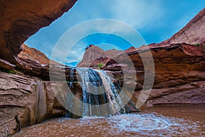 USA, Utah, Escalante Wilderness. Waterfall in Coyote Gulch