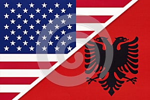 USA vs Albania national flag from textile. Relationship between american and european countries