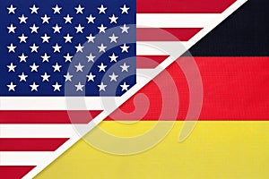 USA vs Germany national flag from textile. Relationship between american and european countries