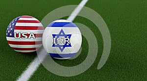 USA vs. Israel Soccer Match - Soccer balls in USA and Israel national colors on a soccer field.