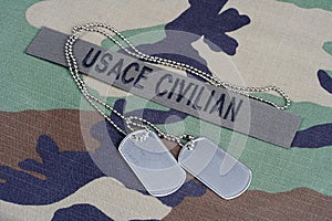 USACE CIVILAN branch tape and dog tags on woodland camouflage uniform
