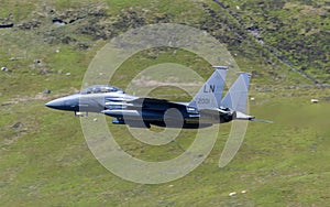 USAF F-15E Strike Eagle flying through the Mach Loop