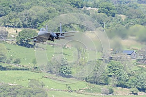USAF F-15E Strike Eagle flying through the Mach Loop