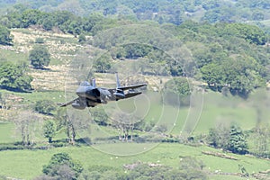 USAF F-15E Strike Eagle flying through the Mach Loop