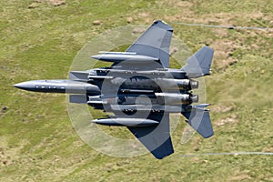 USAF F-15E Strike Eagle flying through the Mach Loop