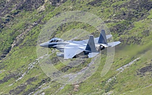 USAF F-15E Strike Eagle flying through the Mach Loop