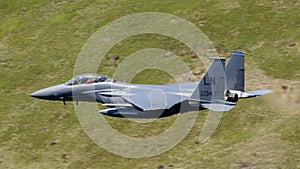 USAF F-15E Strike Eagle flying through the Mach Loop