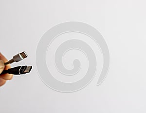 USB C and lighting cable on white  background