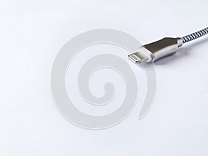 USB cable on grey background.