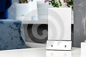 Usb charger battery for device on table in cafe close up