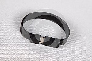 USB flash drive memory set key in bracelet on a white background