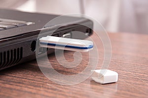 USB flash drive stick connected to laptop