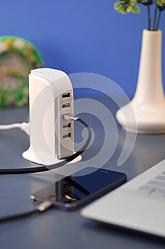 A USB Hub on a office desk, another equipment required when you use Laptop