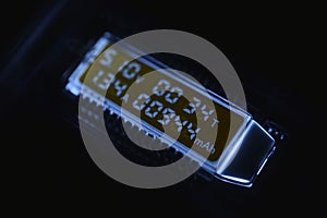 USB measuring device. The electrical meter of the USB devices. The screen of the device in the night