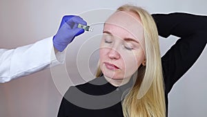 Usb memory stick in head. Flash drive to brain. Girl stands with memory card in her hand and wants to insert it into her body