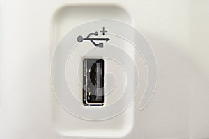 USB plug in on a office machine in detail