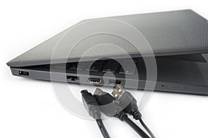 USB and power source plug of modern slim lightweight laptop