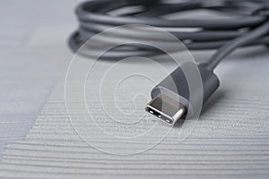 USB Type C connector with a grey cable photo