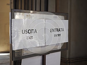 Uscita exit and entrata entry sign