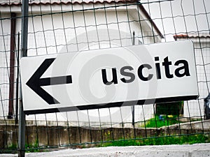 Uscita translated exit stree sign photo