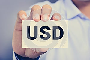 USD letters (United States Dollar currency code) on the card