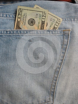 USD notes in blue jeans pocket