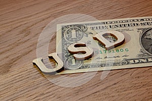 usd word concept made of wooden letters on wooden background