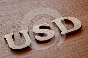 usd word concept made of wooden letters on wooden background