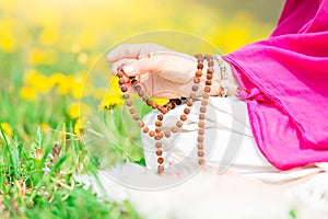 Use of Mala with mantras during a yoga practice