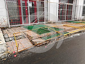 Use other footpath traffic warning sign barrier applying on busy street downtown on pedestrian footpath, road under construction