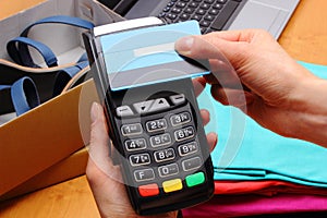 Use payment terminal and credit card with NFC technology for paying for purchases in store