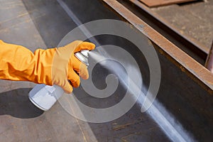Use spray White Contrast on the welded surface photo