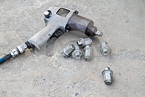 Used air impact wrench and bolts from repair tire