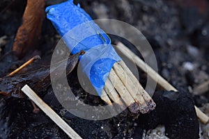 Used and burned matchstick as trash in the environment