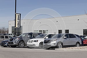 Used car display at a dealership. With supply issues, used and preowned cars are in high demand