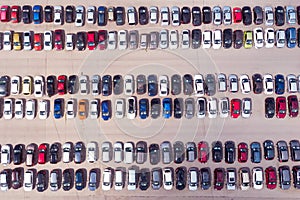 Used car parking, top view of a trade in car parking. Bird`s eye view of a crowded parking lot