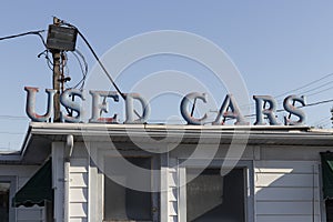 Used Car sign from the 50s at an abandoned pre-owned car dealership