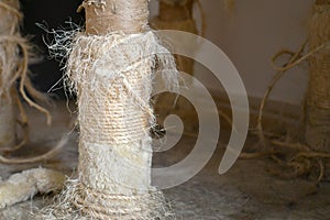 Used cat scratching post. Old cat tower.