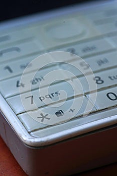 White classic keyboard of the phone in use