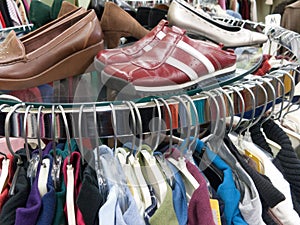 Used Clothing and Shoes at Thrift Store photo