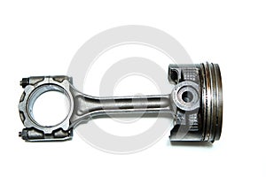 The used and dirty piston with the connecting rod from the sport engine