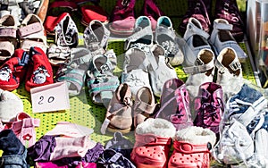 Used girl baby and child shoes for charity,reusing or reselling photo