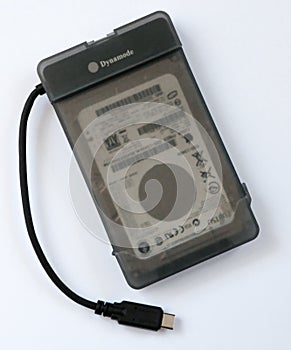 2. 5 inch Hard Disk unit removed from a MacBook Pro and now used as a external backup unit.