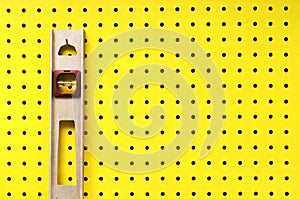 Used level hanging on pegboard photo