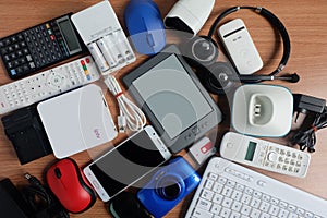 Used modern Electronic gadgets for daily use on wooden floor, Reuse and Recycle concept