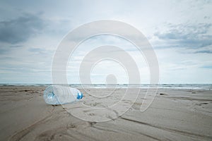 Used plastic bottle on the beach